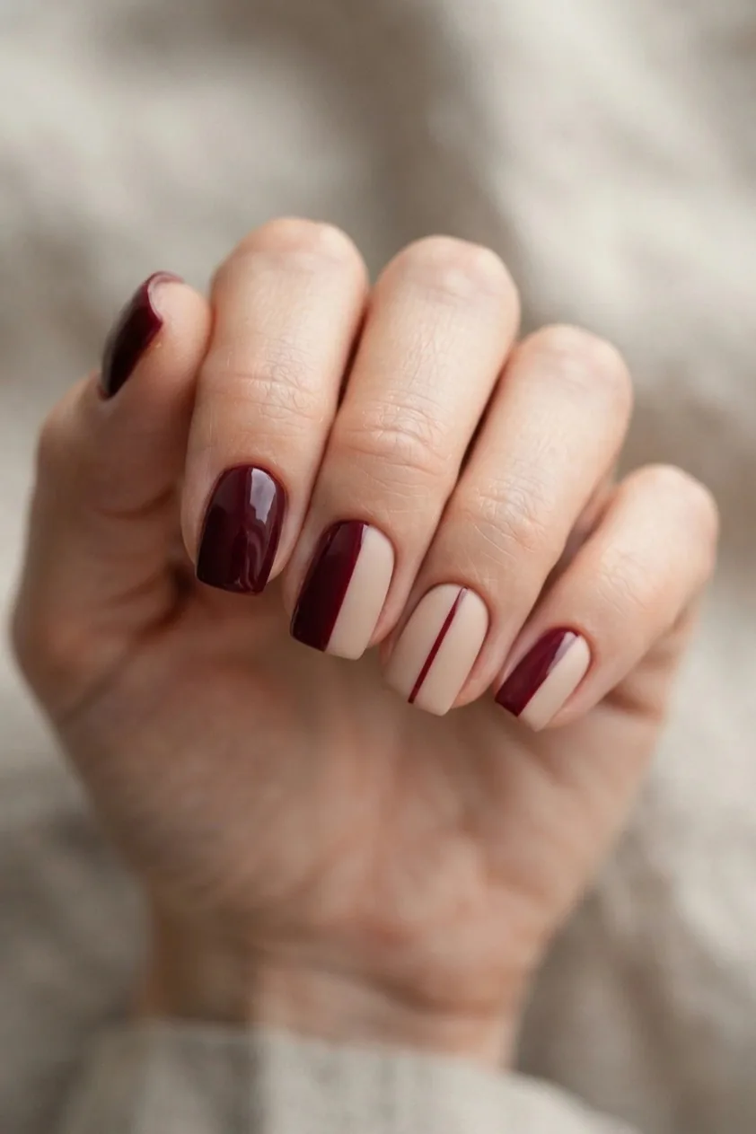Wine to nude ombre fading from the free edge toward the cuticle
