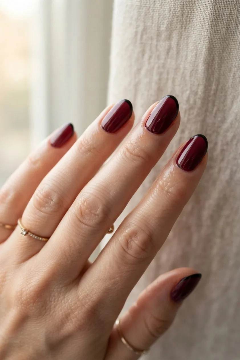Skittle gradient running from light wine to deep burgundy across five nails